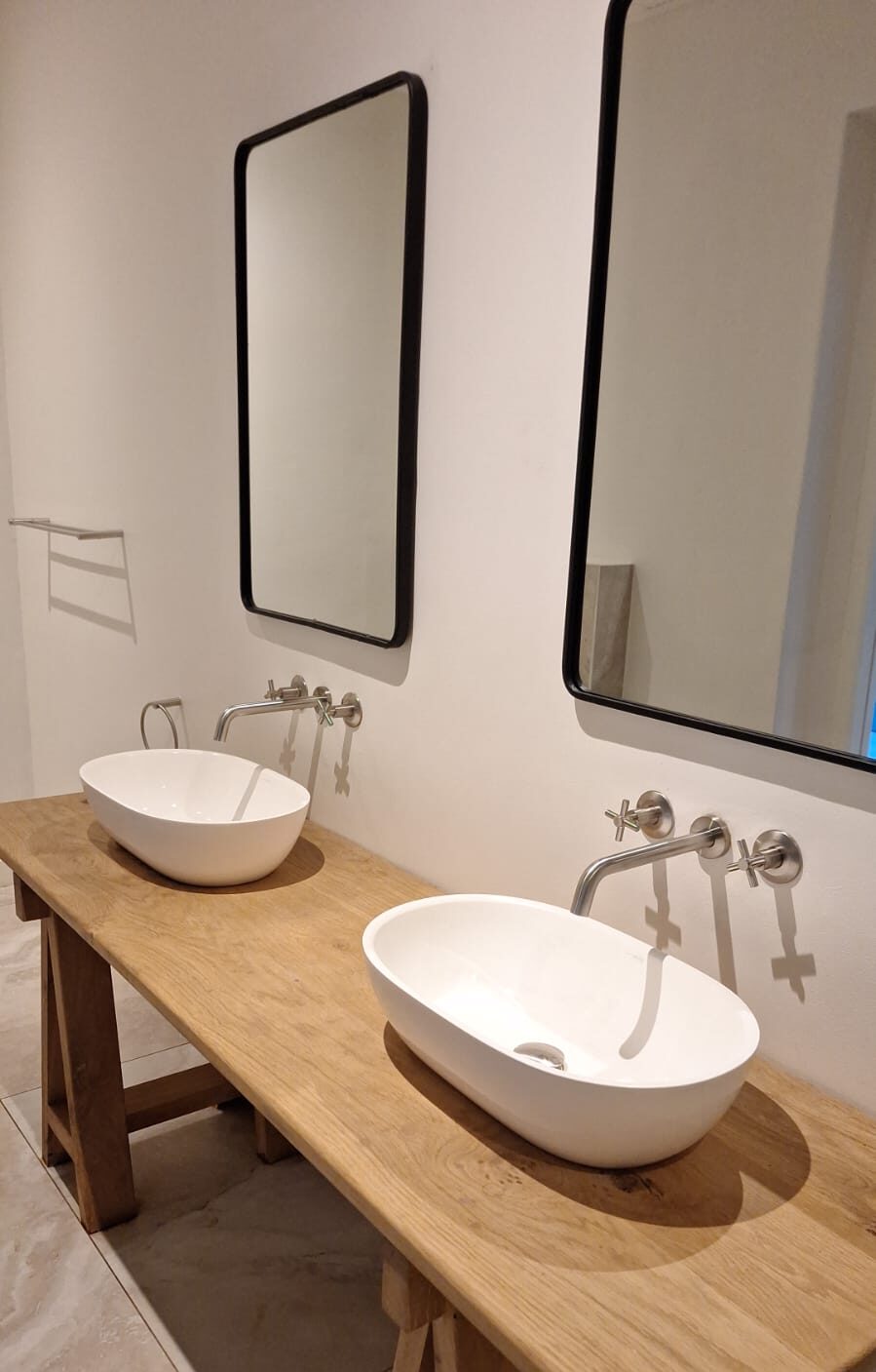 Bathroom with timber trestle vanity and vessel basins