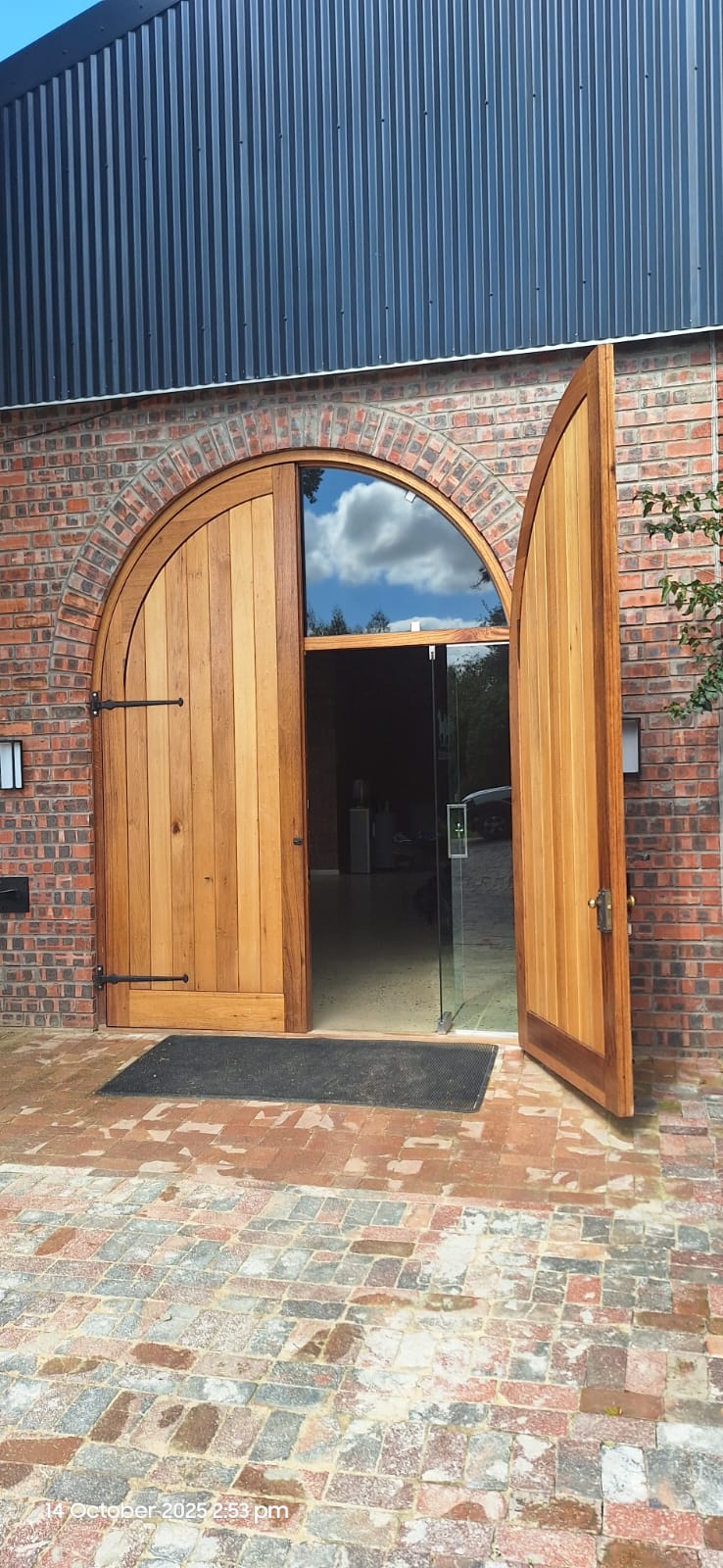 Arched wooden barn doors
