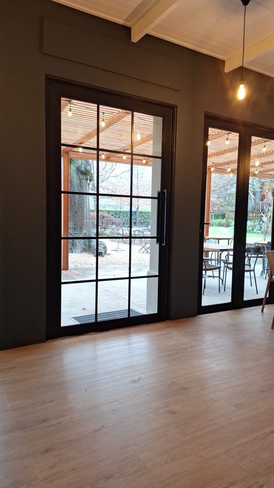 Interior with steel doors and timber floor