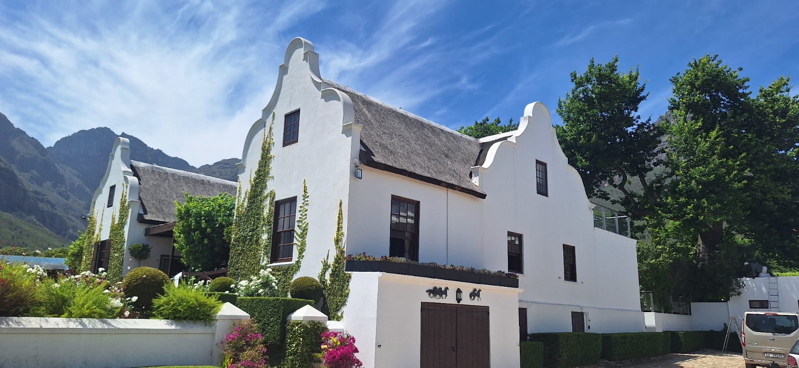 Cape Dutch manor with thatched roof