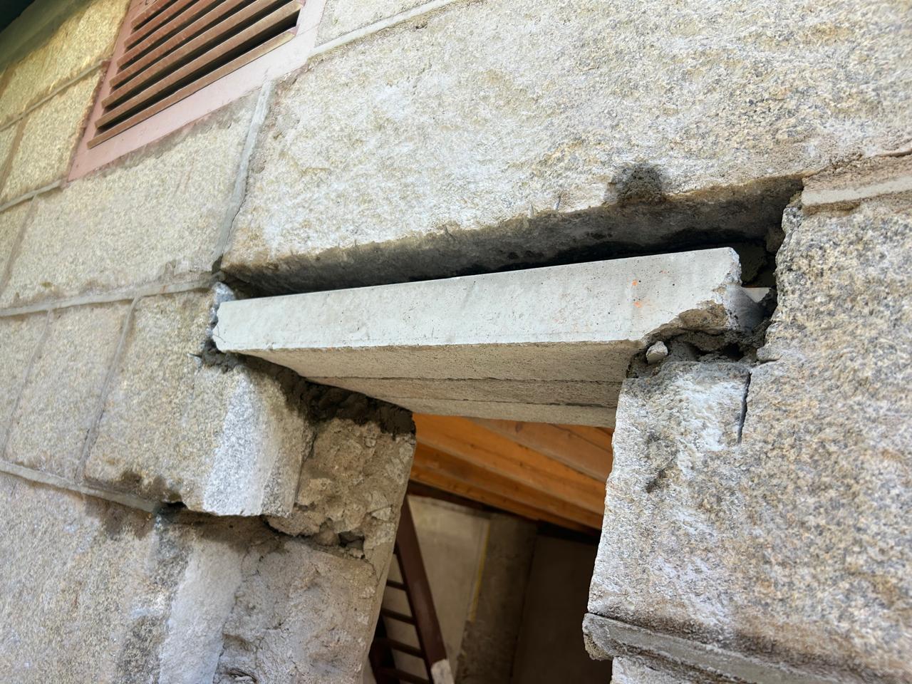 New lintel set into stone wall